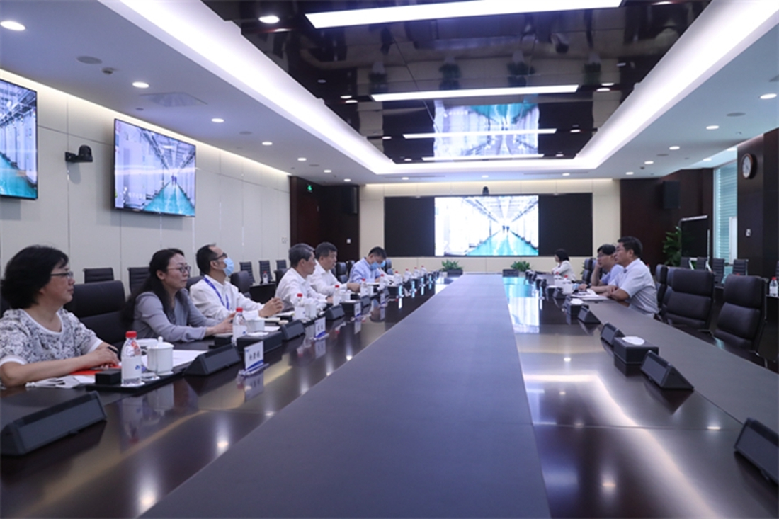 陽世昊副總經理會見國家檔案局副局長付華